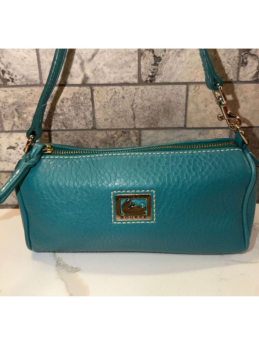6.  Dooney Barrel Bag